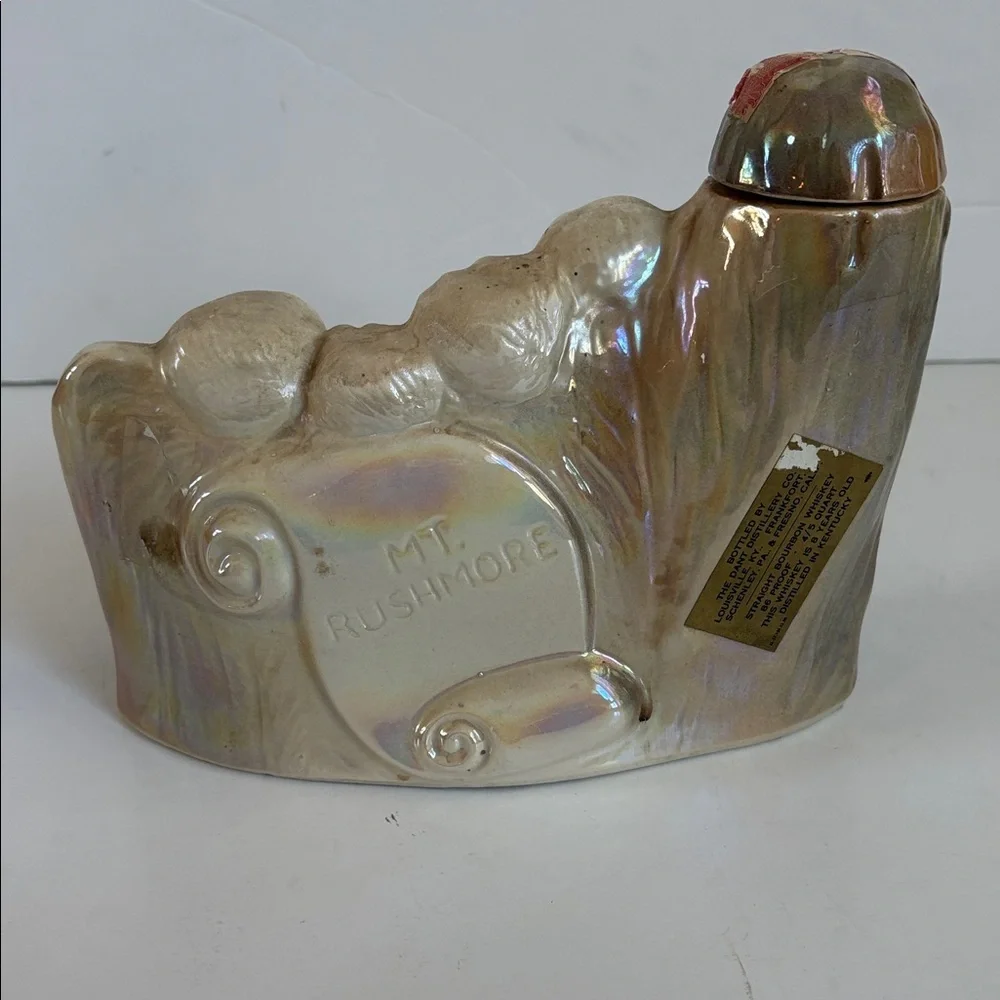 Vintage J.W. Dant Mt. Rushmore whiskey decanter ceramic iridescent pearl glaze